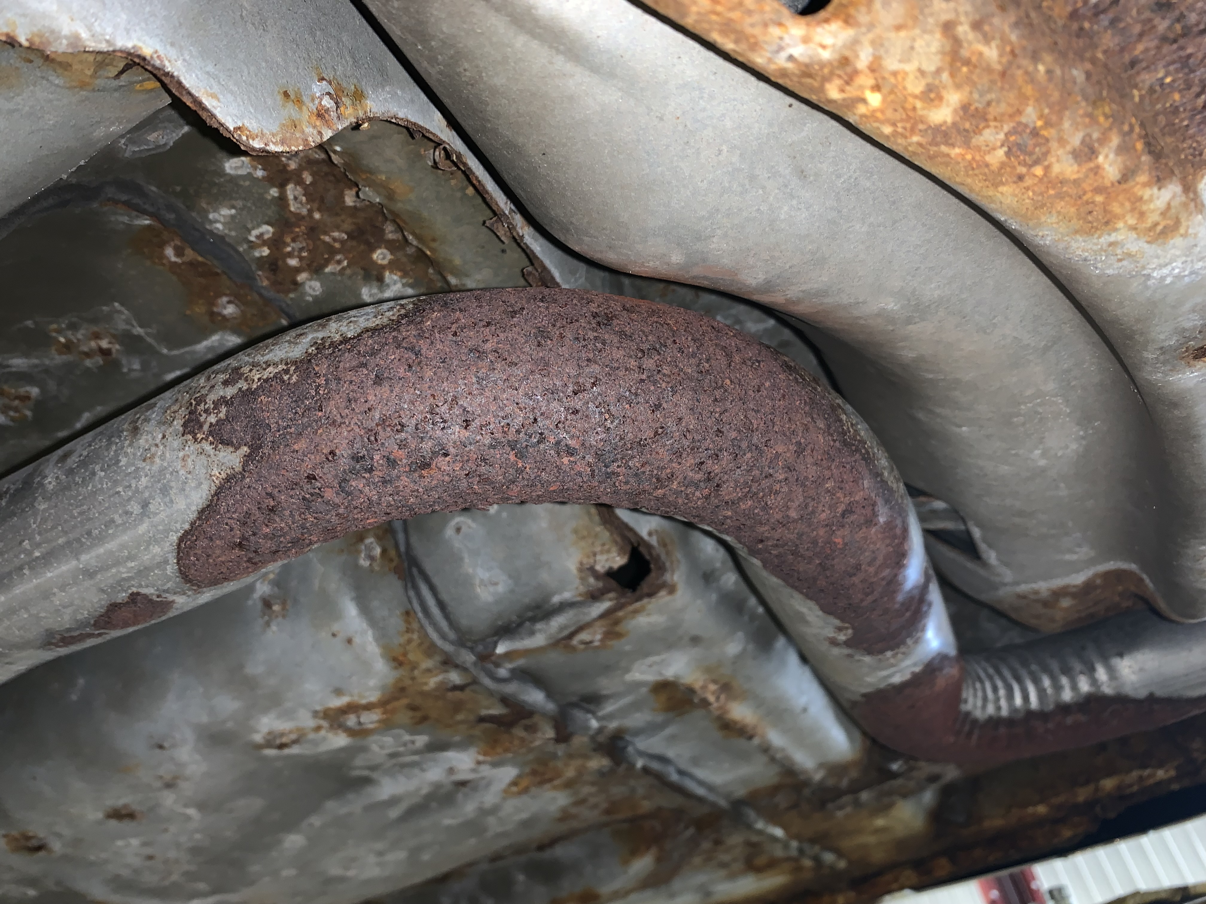 https://www.louscarcare.com/Files/Blog/images/Rusted%20Exhaust%20Pipe%20Lou's%20Car%20Care%20Baldwinsville%20NY%2013027.JPG